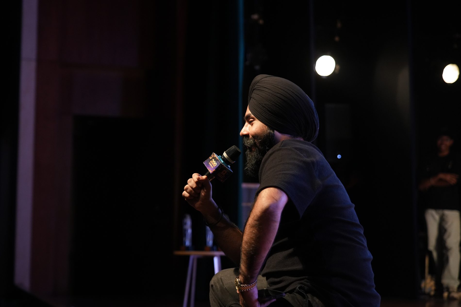 Harman on the mic